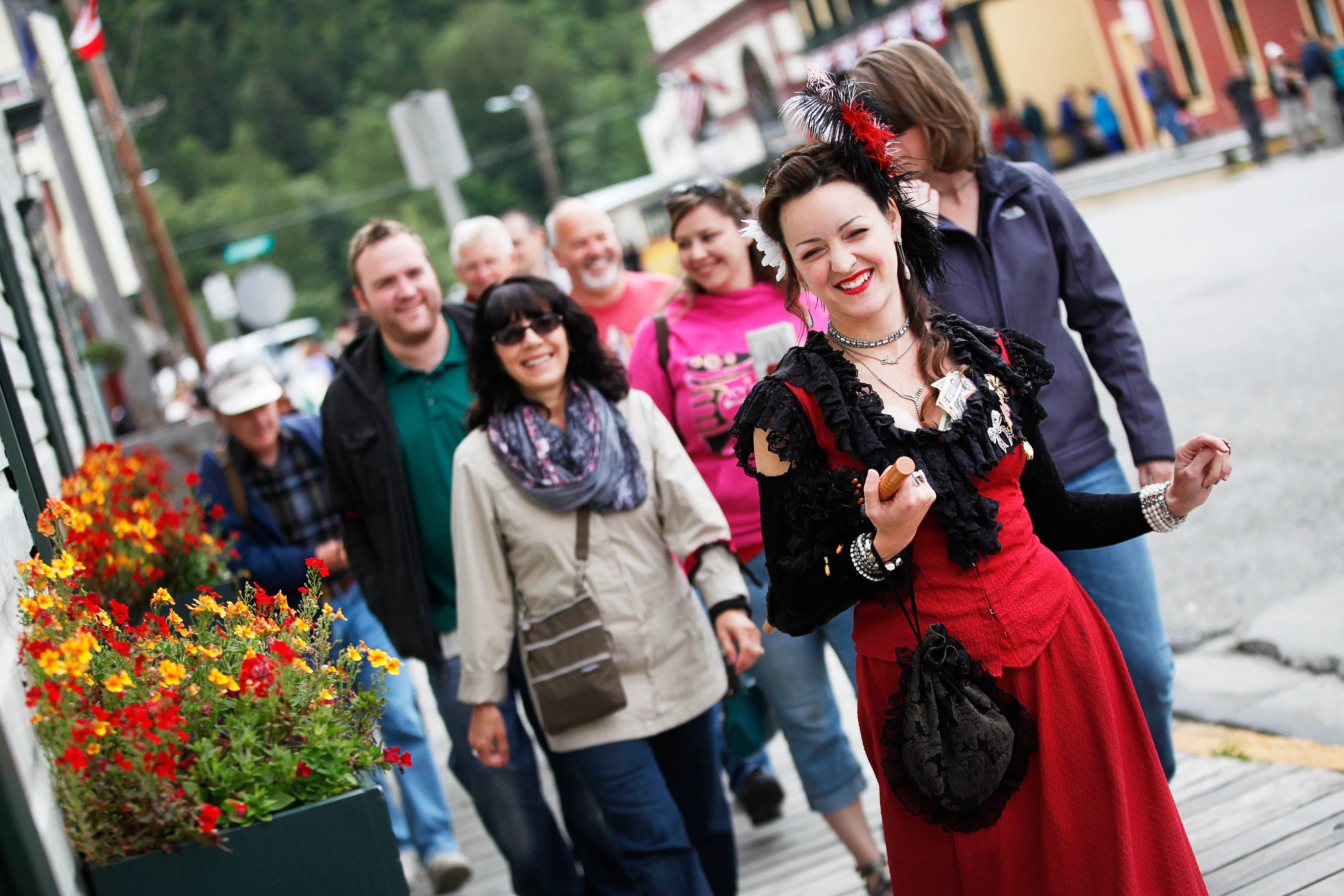 Madam leading a walking tour through Skagway
